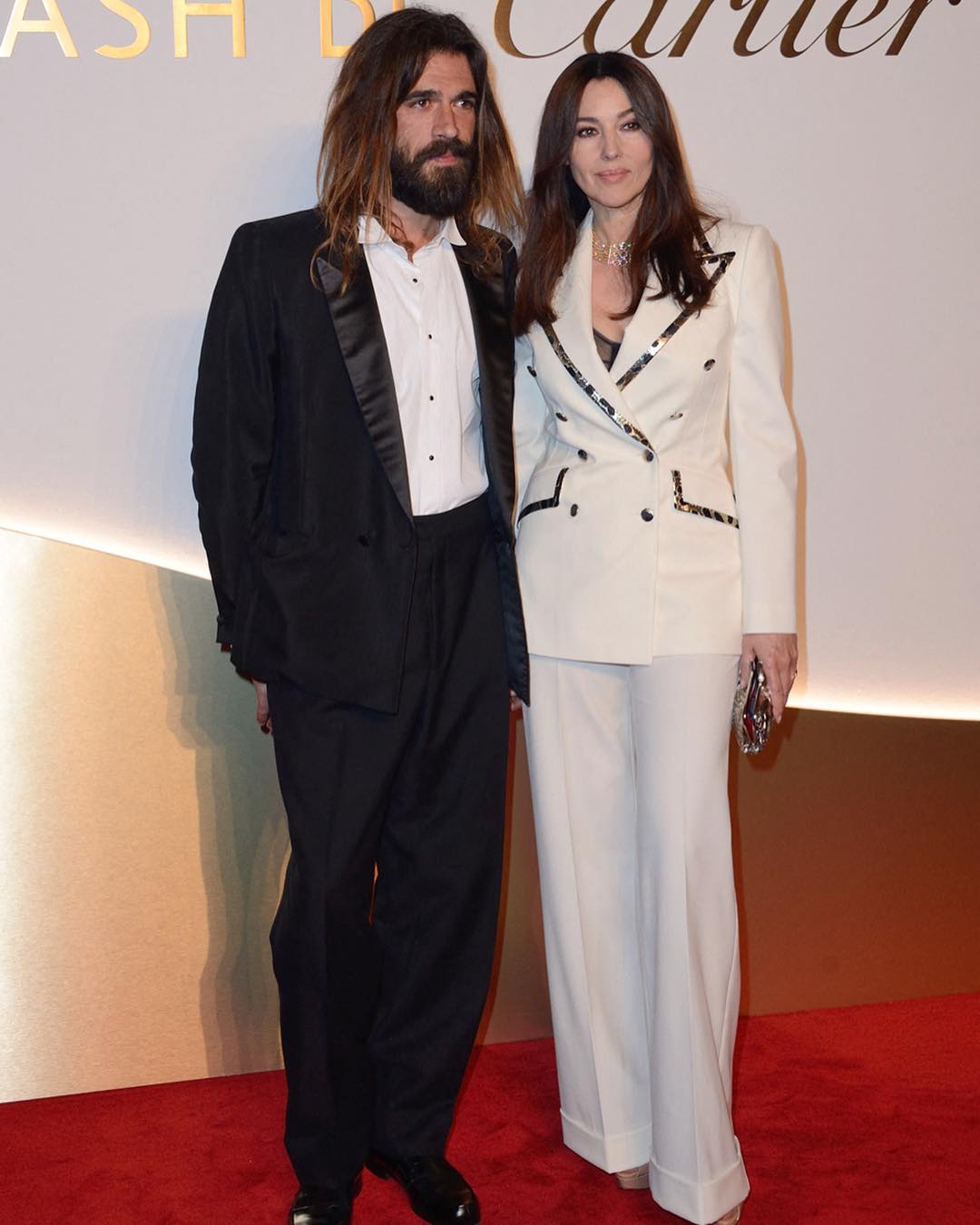 Моника Беллуччи на вечеринке Cartier: в костюме Dolce &amp; Gabbana  и под руку с любимым