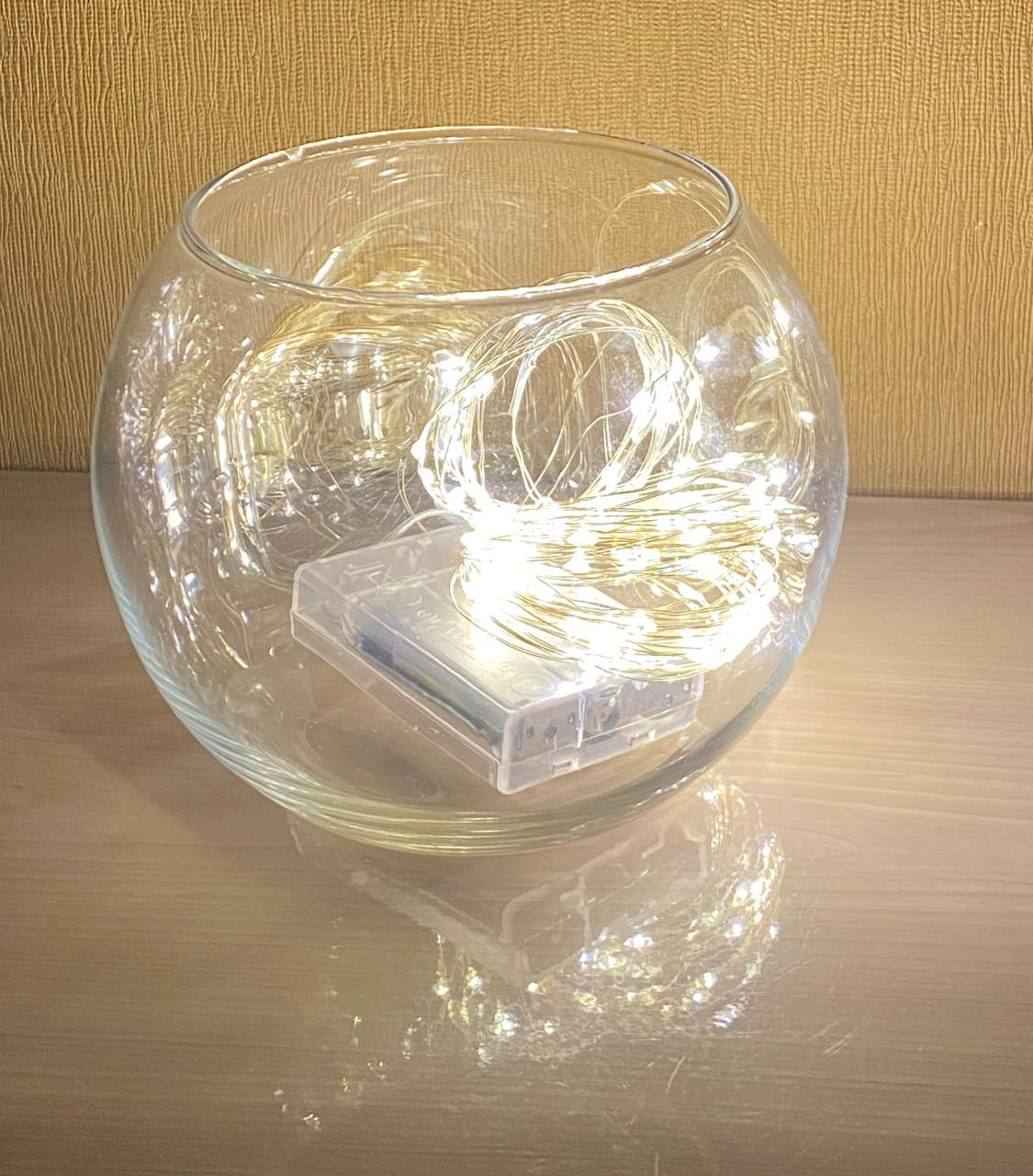 Зробіть такий світильник з гірлянди. Це краще будь-яких ліхтарів і свічок