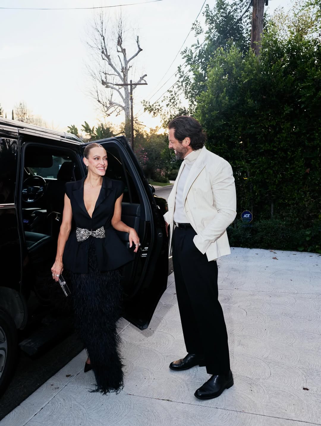 Total black и светлый контраст: Чмерковский с женой нарушили правило парных образов