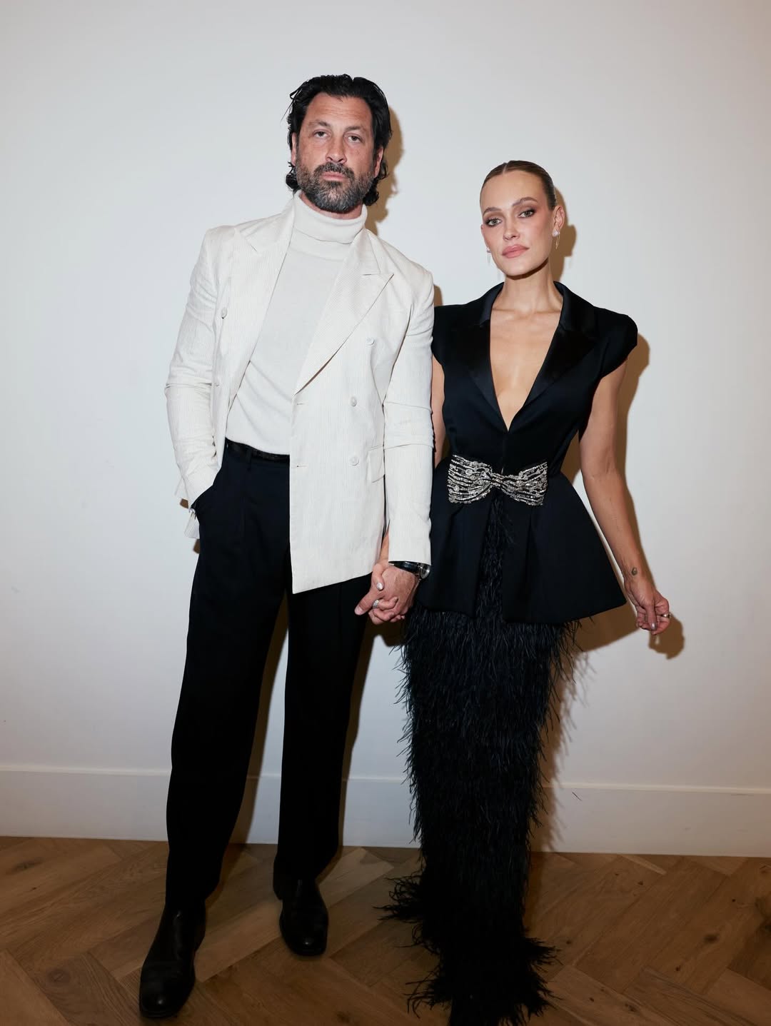 Total black и светлый контраст: Чмерковский с женой нарушили правило парных образов