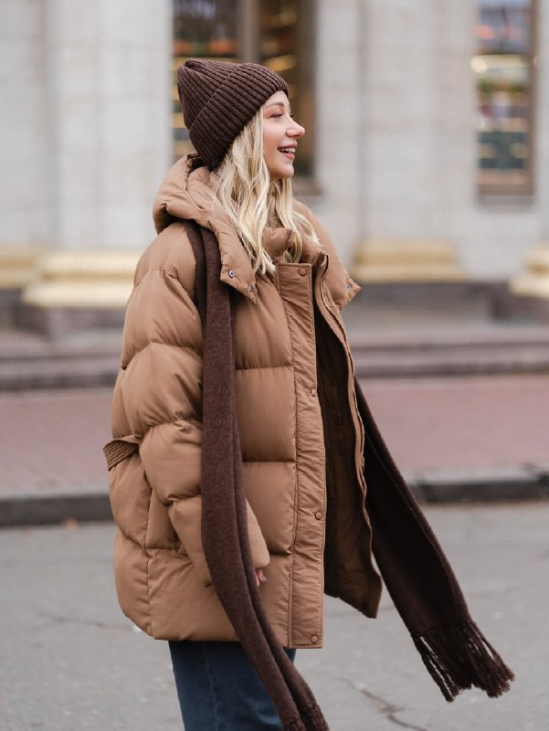 Пуховик, джинси та шарф: зимовий образ дружини Павліка, який варто повторити