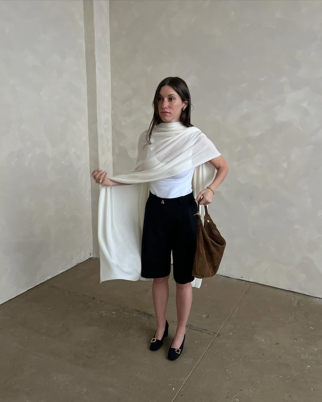 Довгі шорти - порятунок у спеку: з чим їх носити влітку 2025