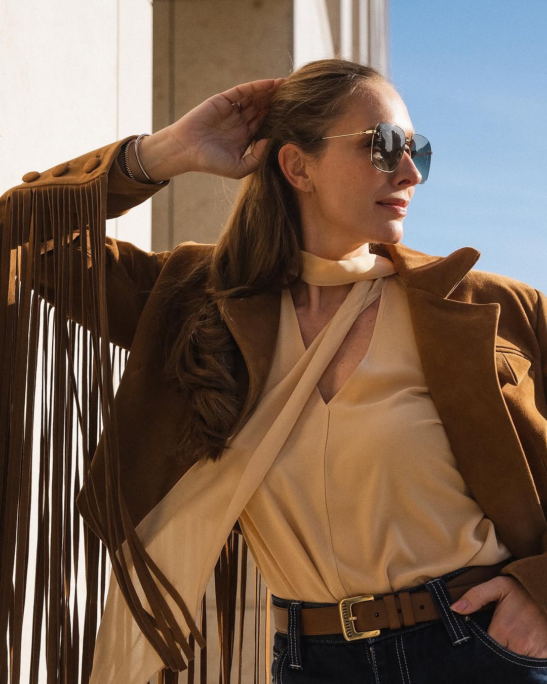 Бахрома, замша і чоботи-"козаки": Катя Осадча показала ідеальний весняний образ у стилі бохо