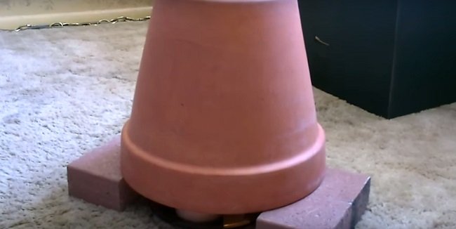 Проста пічка власними руками: зі свічок, цегли та квіткових горщиків