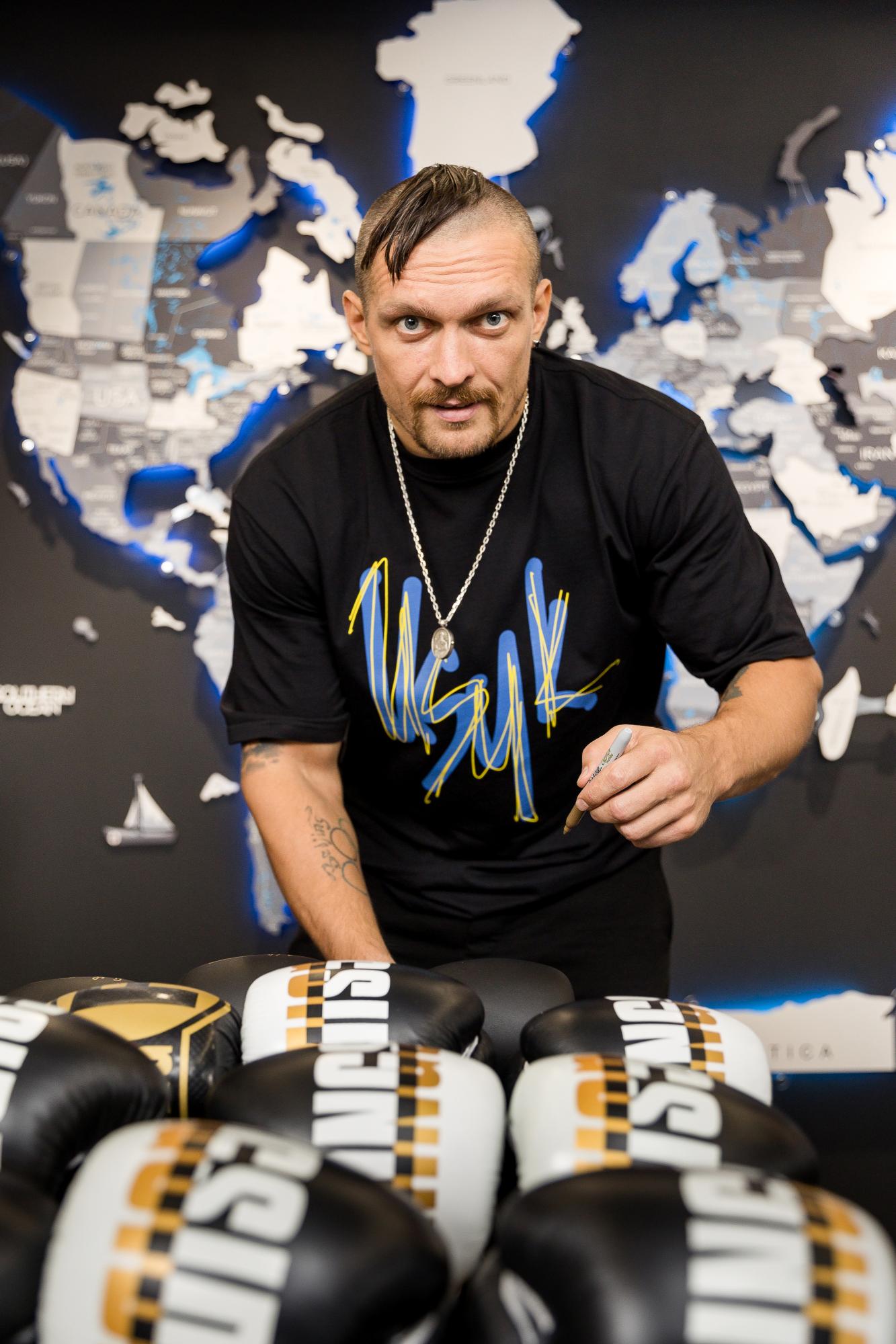 Усик и криптобиржа QMALL объявили о сотрудничестве