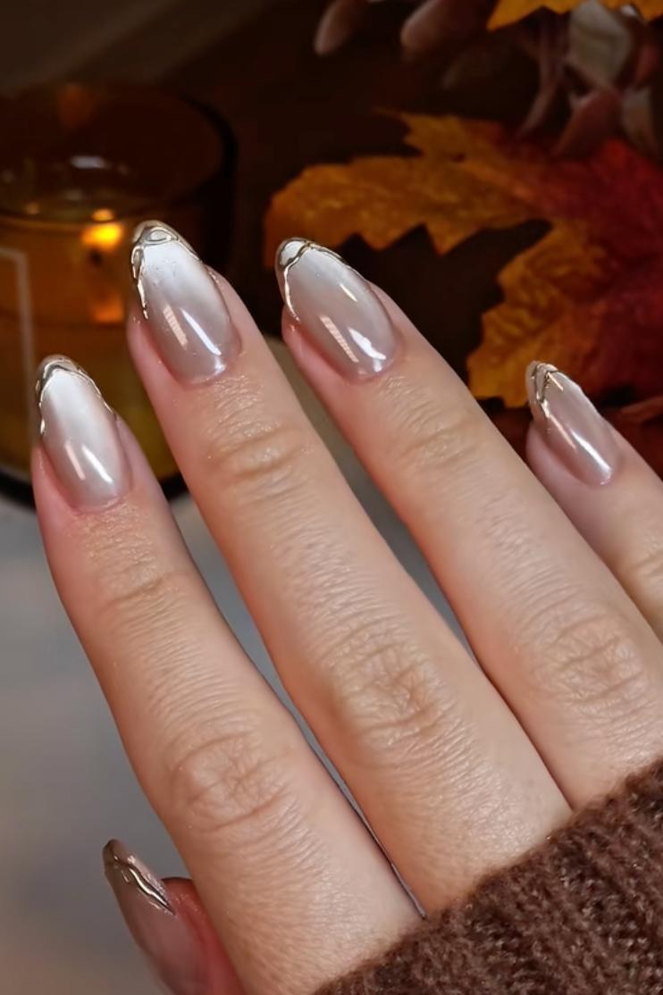 Трендовий манікюр "котяче око", який хочеться повторити: 5 стильних ідей для яскравої осені