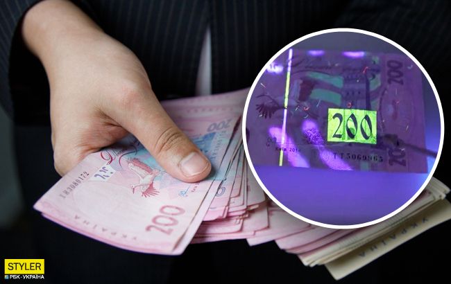 Как "на глаз" отличить фальшивые 200 гривен от настоящих: видеоинструкция