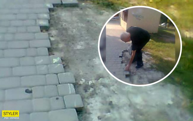 В Днепре мужчина разбирал брусчатку и клал ее себе в сумку: "каждый день по несколько штук" (фото)