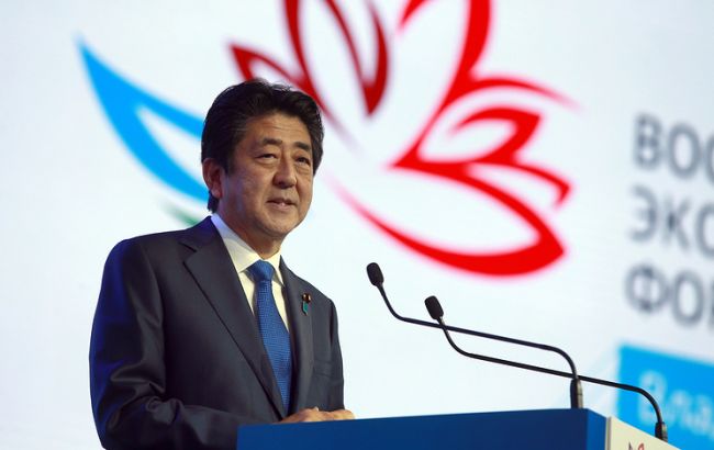 Премьер Японии призвал Путина поставить точку в территориальном споре