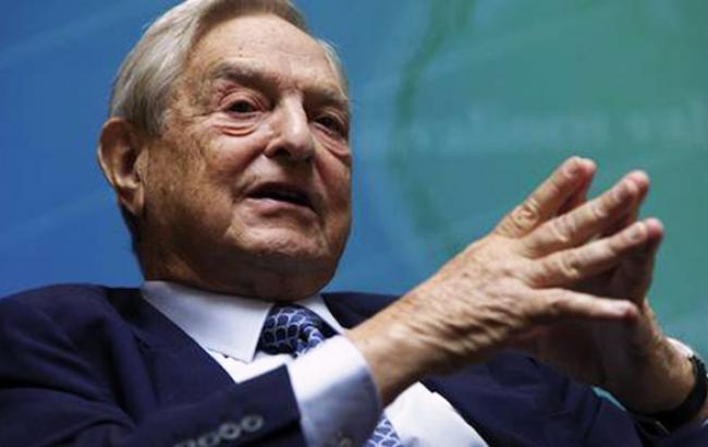 Путін хоче встигнути знищити Україну до економічного колапсу в Росії, - Сорос