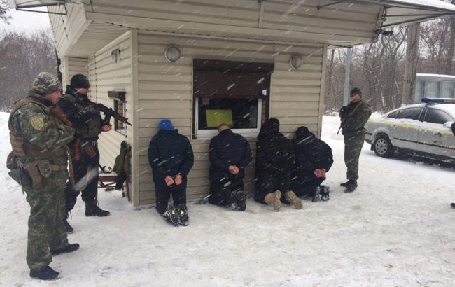 В Харькове неизвестные с оружием отобрали у мужчины сумку с миллионом гривен