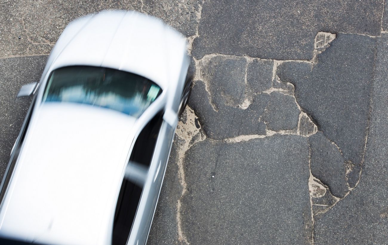 Ямы на дорогах – как правильно ехать на машине РБК Украина