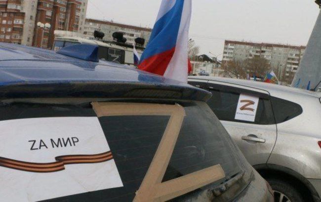 Вешают таблички "Za мир". Оккупанты массово отжимают авто в Энергодаре