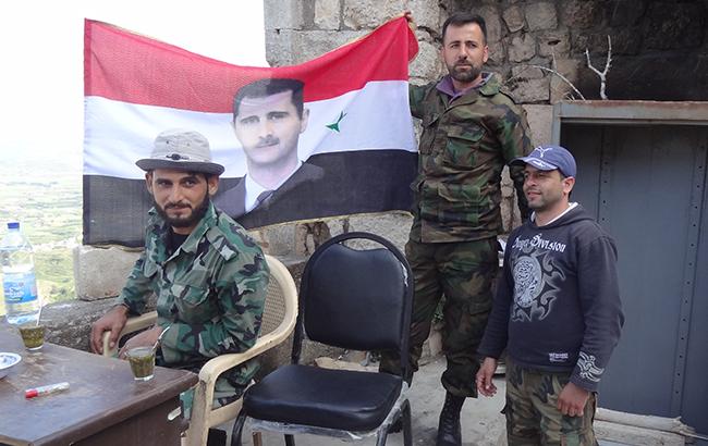 Народ Башара Асада: божественный свет, человек на Луне и века геноцида