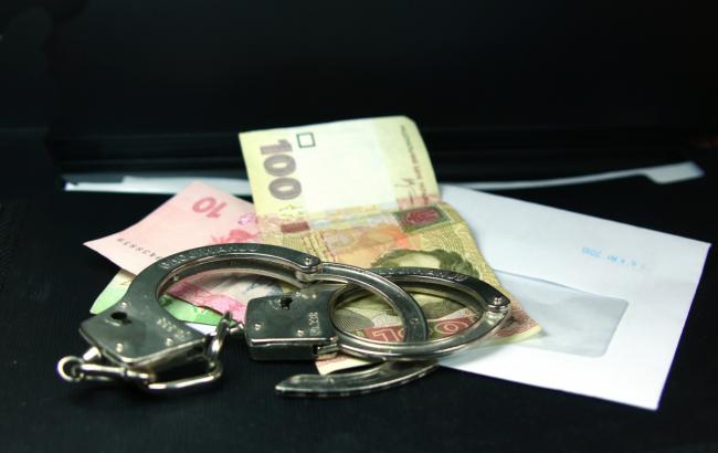 В Житомирской обл. арестовали задержанных на взятке председателей РГА и райсовета